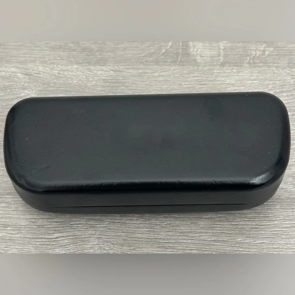 COACH New York Glasses case Black. Used. Has some small dents. See photo.